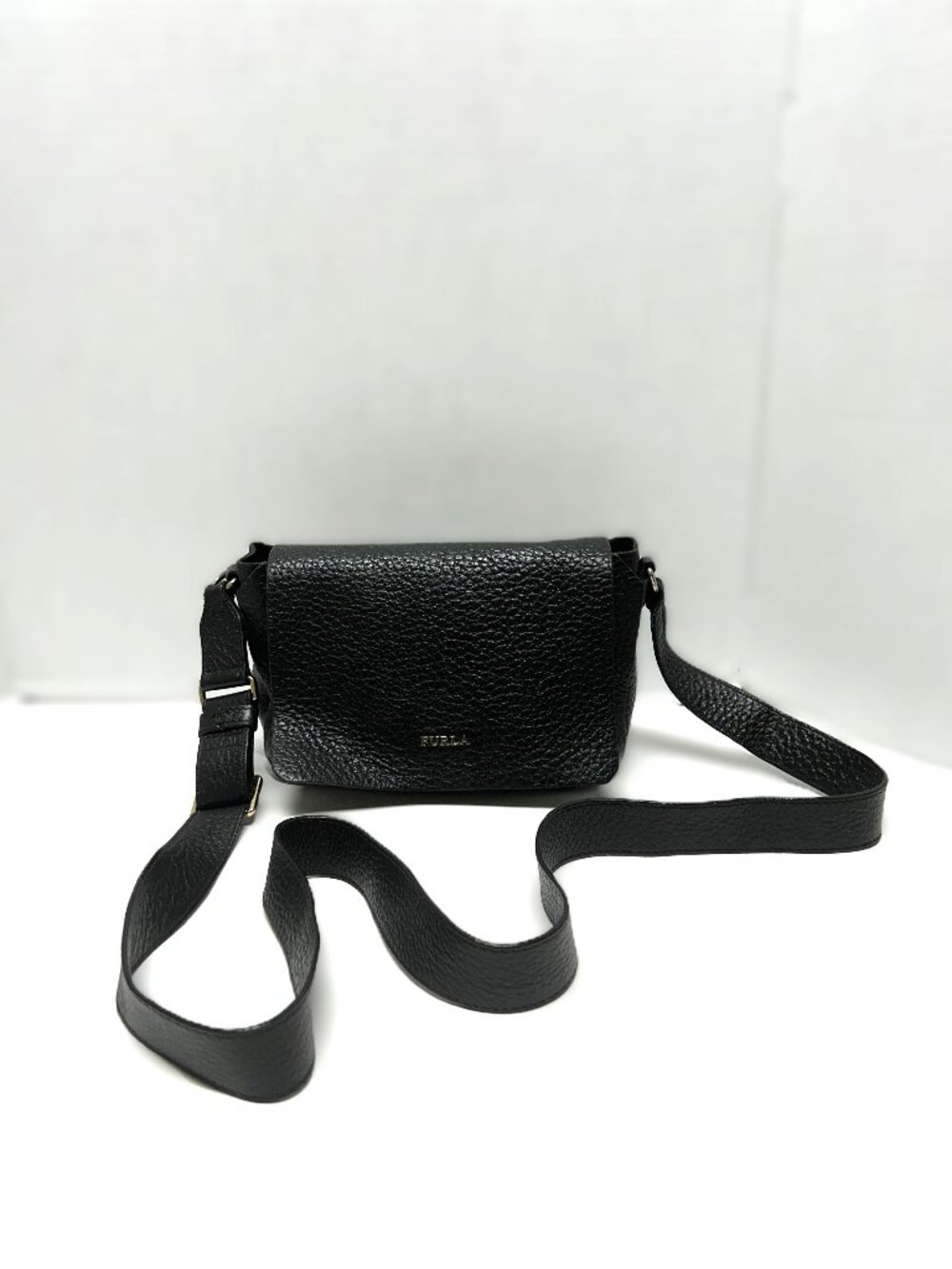Black leather foldover crossbody bag by Furla